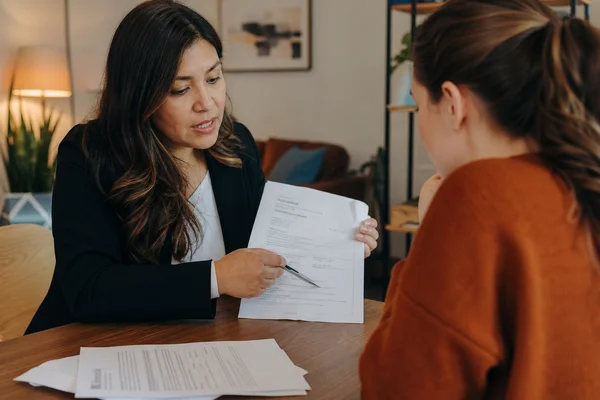 Austin apartment locator reviewing income documentation with a first time renter who has no credit history